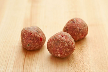 Lamb Meatballs W/ Thyme, Rosemary, Onions, Fresh Peppers, Black Pepper & Salt ($1.50 each)