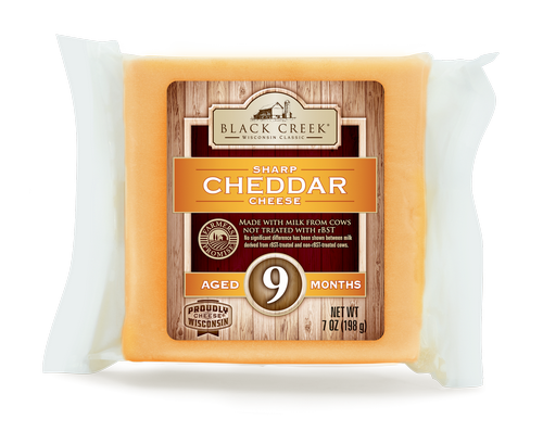 Cheddar Cheese Aged 9 months, Black Creek. 7 oz